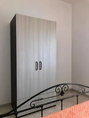Letto o letti in una camera di Casa Ilenia