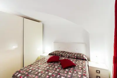 Letto o letti in una camera di GuestHost - Catania Central Flat