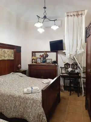 Letto o letti in una camera di Casetta Sarina