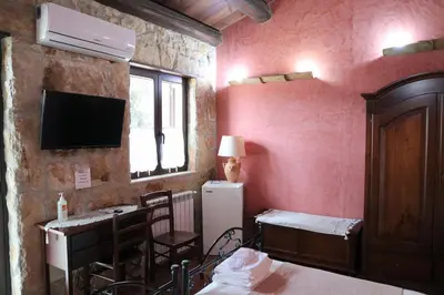 Letto o letti in una camera di B&B Villa Giusy