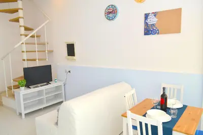 TV o dispositivi per l'intrattenimento presso Flamingo SPA Loft by Picasa Sicilia - SEASIDE - SEA & ORTIGIA VIEW