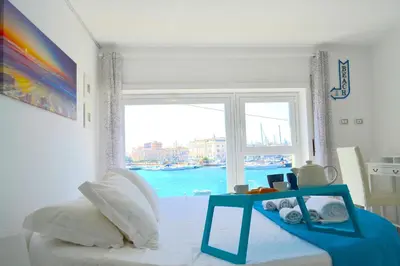 Piscina di Flamingo SPA Loft by Picasa Sicilia - SEASIDE - SEA & ORTIGIA VIEW o nelle vicinanze