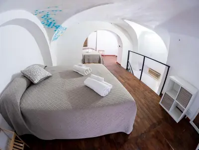Letto o letti in una camera di SikulaHouse - apartment in the city center