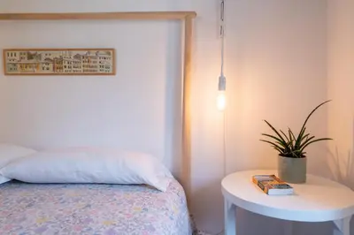 Letto o letti in una camera di GuestHost - Ortigia Colourful Apartment
