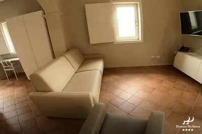 TV o dispositivi per l'intrattenimento presso Domus Hyblaea Resort