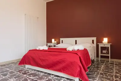 Letto o letti in una camera di Al Corso Apartments