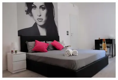 Letto o letti in una camera di B&B Elmi