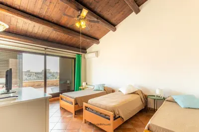 Letto o letti in una camera di Villa Rosaria Rooms