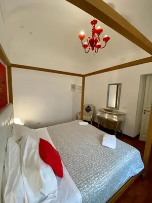 Letto o letti in una camera di La Via della Giudecca