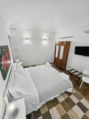 Letto o letti in una camera di La Via della Giudecca