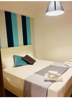 Letto o letti in una camera di Giupy Home