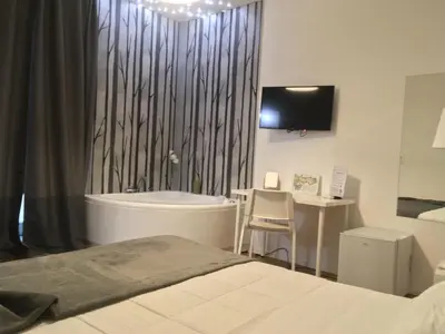 Letto o letti in una camera di Reusuite