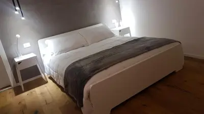 Letto o letti in una camera di Reusuite