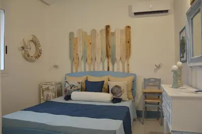 Letto o letti in una camera di La Casa in Riva al Mare