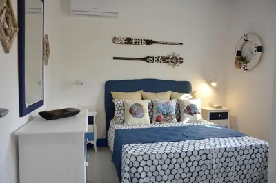 Letto o letti in una camera di La Casa in Riva al Mare