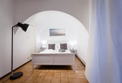 Letto o letti in una camera di City Center Apartments Catania