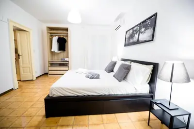 Letto o letti in una camera di City Center Apartments Catania