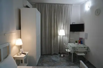 TV o dispositivi per l'intrattenimento presso Magrì Apartments Catania