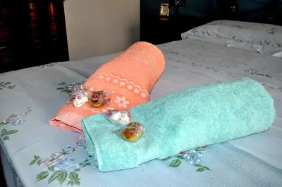 Letto o letti in una camera di Arte' rooms, nel cuore di Siracusa