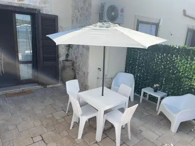 Patio o area all'aperto di Casa vacanze Barbera con piscina