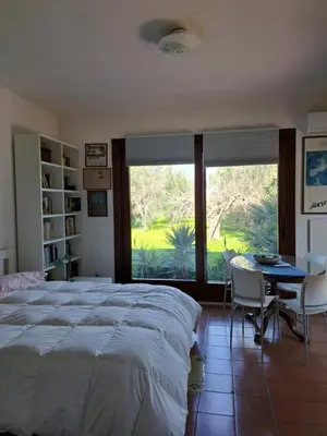 Letto o letti in una camera di Casa Gelsomino