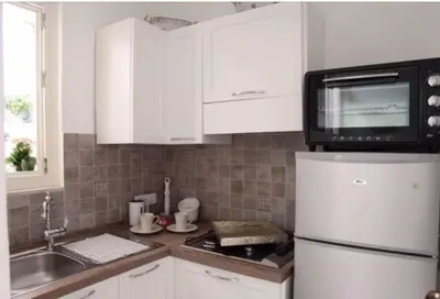 Cucina o angolo cottura di Ortigia MaaM Apartment