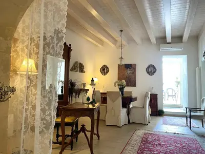 Area soggiorno di Ortigia MaaM Apartment