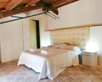 Letto o letti in una camera di Landolina Palace Hotel