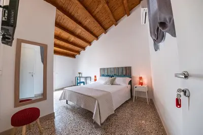 Letto o letti in una camera di B&B - Le Tre Comari
