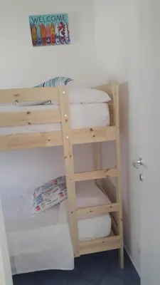 Letto o letti in una camera di Falso pepe Marzamemi