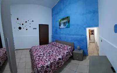 Letto o letti in una camera di Casa al Duomo