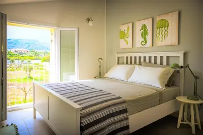 Letto o letti in una camera di La Bouganville