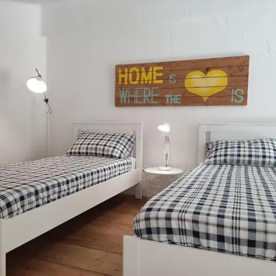 Letto o letti in una camera di La Bouganville