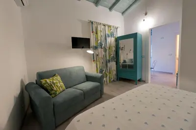 Letto o letti in una camera di Le tre muse
