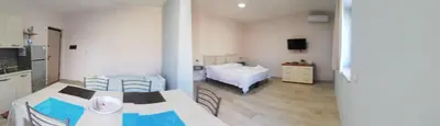 Letto o letti in una camera di Narciso