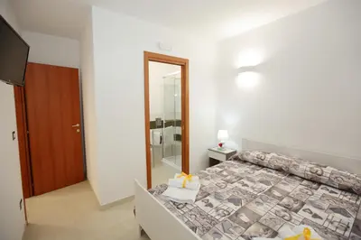 Letto o letti in una camera di La casa di Cristina