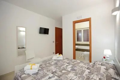 Letto o letti in una camera di La casa di Cristina