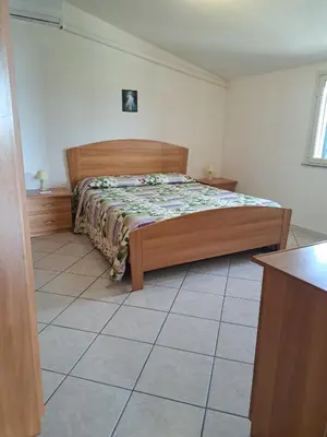 Letto o letti in una camera di Casa Concetta
