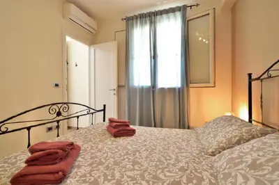 Letto o letti in una camera di LA DIGA - Bilocale a Marzamemi, fronte mare