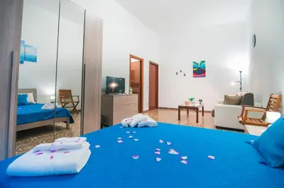 Letto o letti in una camera di B&B U PRUFISSURI