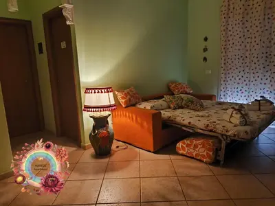Letto o letti in una camera di Rainbow Apartment