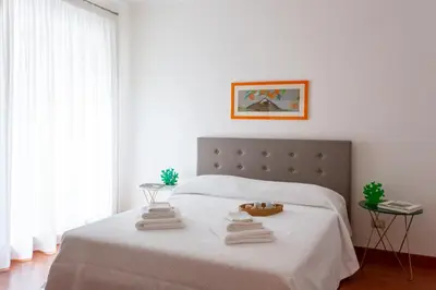 Letto o letti in una camera di Suite La Pergola - Centro Storico