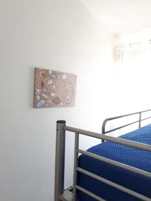 Letto o letti in una camera di Sun & Sea, holidays home