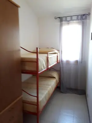 Letto o letti in una camera di Sun & Sea, holidays home
