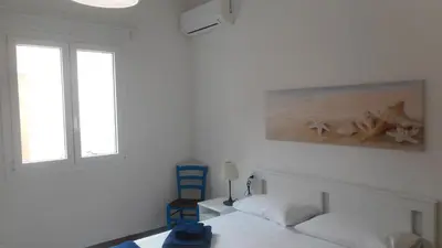 Letto o letti in una camera di Trinacria Bedda