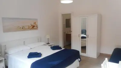 Letto o letti in una camera di Trinacria Bedda