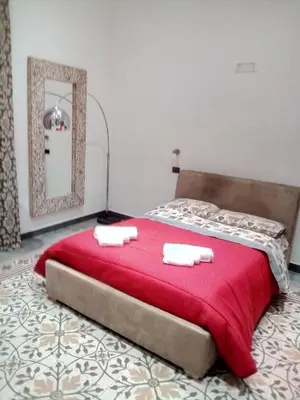 Letto o letti in una camera di Via Pezza 100