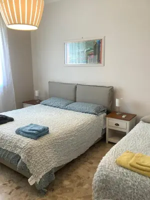Letto o letti in una camera di Artemisia