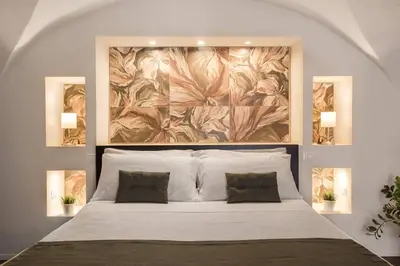 Letto o letti in una camera di Le Pennellate Short Lets
