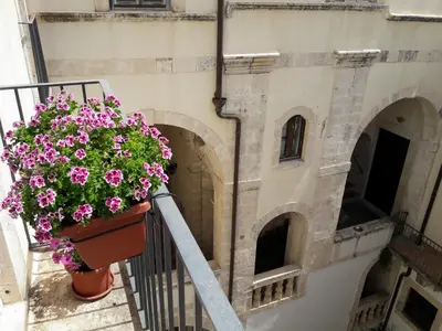 Balcone o terrazza di Incantevole appartamento in palazzo storico Ortigia